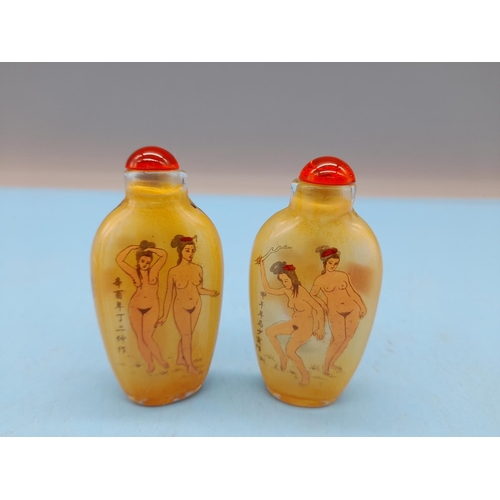 30 - Oriental Scent Bottles depicting Nude Figures (2). 7.5cm Tall.