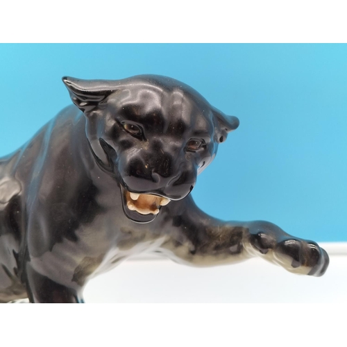 312 - Beswick Figure of a Black Puma on Rock. 21cm High x 32cm.