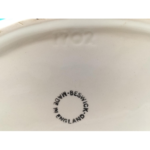 312 - Beswick Figure of a Black Puma on Rock. 21cm High x 32cm.