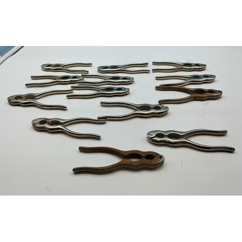 585 - Collection of Metal 14cm Nut Crackers (13).