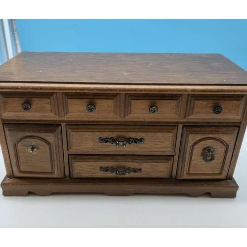 77 - Wooden Jewellery Box with Lift Top, 2 Drawers and 2 Pull Down Cupboards. 19cm High, 37cm x 17cm. 1 H... 