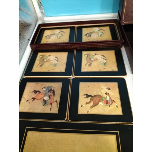 19 - Lady Clare Hand Gilded and Lacquered Finish Place Mats and Coasters in 'Ming Polo' Design.