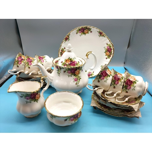 329 - Royal Albert 22 Piece Tea Set in the 'Old Country Roses' Pattern. In Original Box. Seconds Quality.