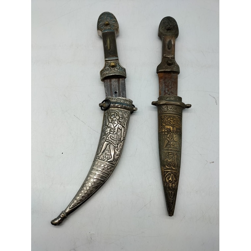 52 - Vintage Islamic/Indian Daggers in Sheaths (2). One Sheath A/F.