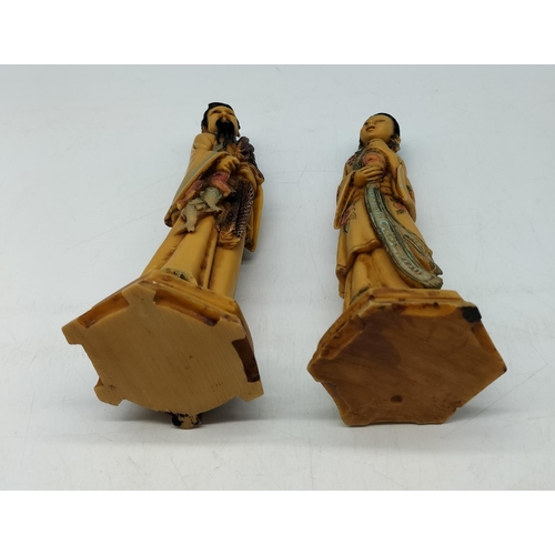 592 - Pair of 21cm Oriental Man and Lady Figurines.