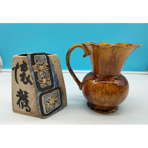 676 - Tenmoku Pottery Signed 14cm vase plus 17cm Flo Jug.