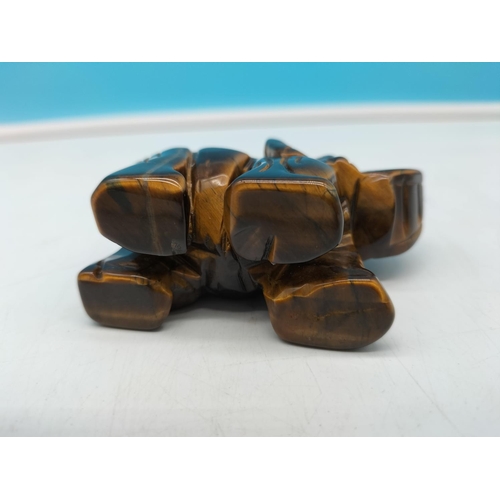 139 - Hand Carved Tigers Eye Elephant Figure. 8cm x 6cm.