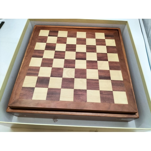 148 - Premier 7 Game Set to include Chess, Draughts, Backgammon, etc. Board measures 34cm x 34cm x 7cm.