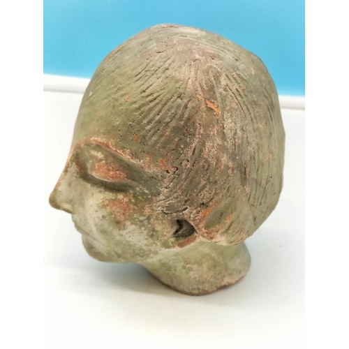 159 - Terracotta Art Deco Head of an Woman. 17cm High, 15cm x 12cm. Some Chipping.