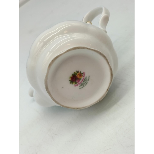 273 - Royal Albert Miniature 10cm (h) Teapot in the 'Old Country Roses' Pattern.