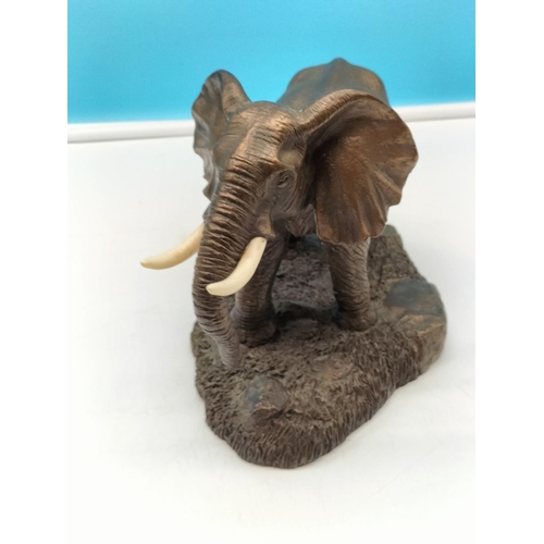 279 - EB Safari Bronze Effect Model of an Elephant. 19cm high, 29cm long.