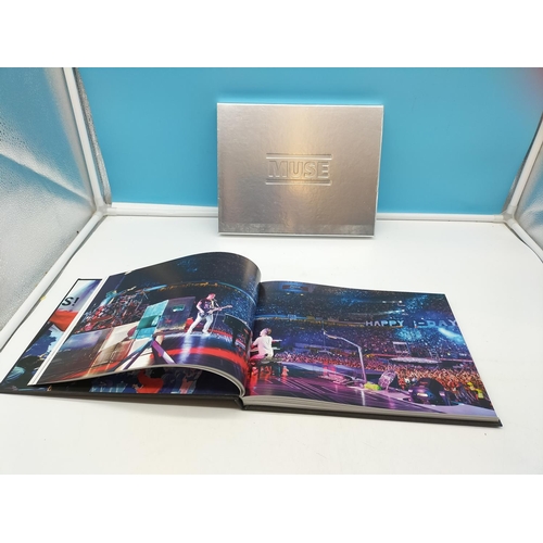 298 - Muse 'The Resistance Tour Photo Book 2010' Hardback Book with Slip Case.