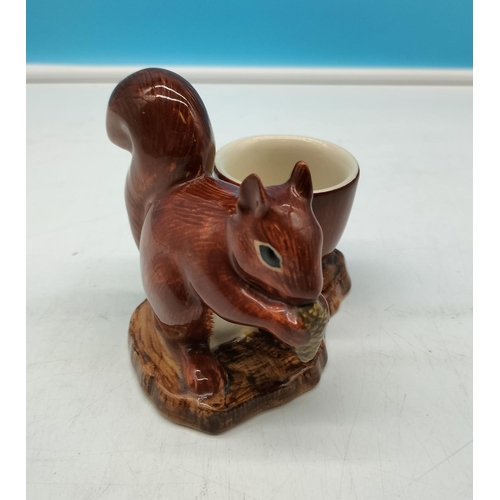 304 - Quail Pottery 'Squirrel' Egg Cup. 9cm High, 11cm x 11cm.