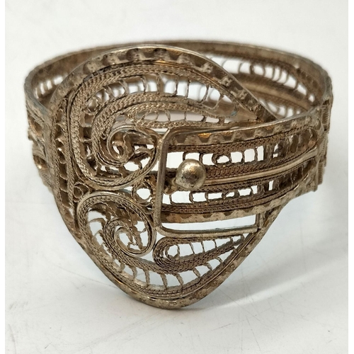 520 - White Metal Filigree Bangle. 6cm Diameter.