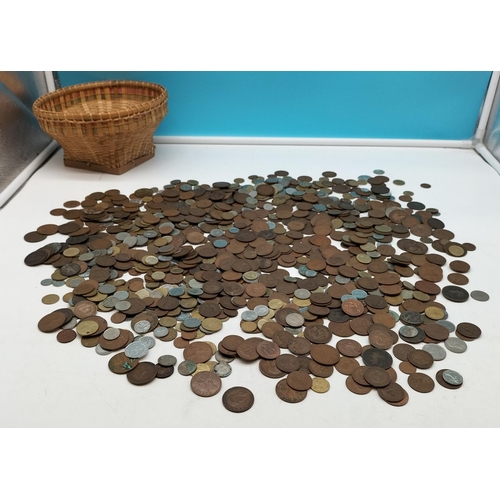 521 - Basket of Mixed Coins to include Pennies, Half Pennies and World Coins.