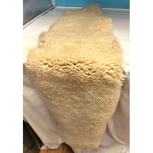 635 - Sheepskin Rug. 170cm x 48cm.