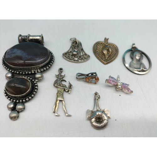 674 - White Metal and 925 Silver Pendants (8).