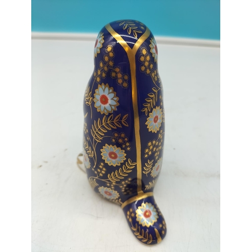 69 - Royal Crown Derby 'Platypus' Paperweight with Silver Stopper. 12cm Tall.