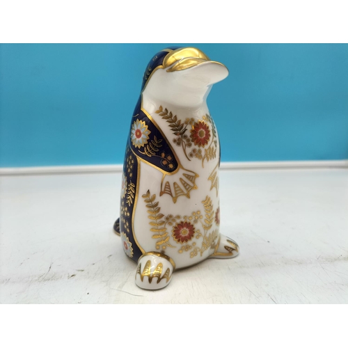 69 - Royal Crown Derby 'Platypus' Paperweight with Silver Stopper. 12cm Tall.