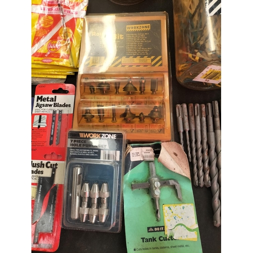 711 - Tray of New Hardware Items to Incl. Drills, Blades, Router Set, etc.