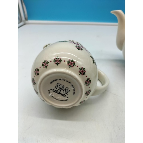 79 - Teapot and Milk Jug by Stir It Up & Celebrate. Largest 16cm High x 23cm.