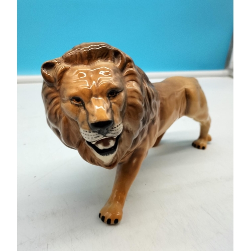 29 - Beswick Figure of a Lion 14cm High x 23cm.