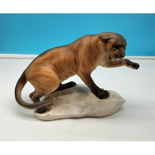 30 - Beswick Figure of a Puma on a Rock. 21cm High x 30cm Long.