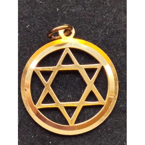 647 - 375 9ct Gold 'Star of David' Pendant.