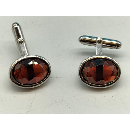 675 - Pair of 925 Silver and Garnet Cufflinks.