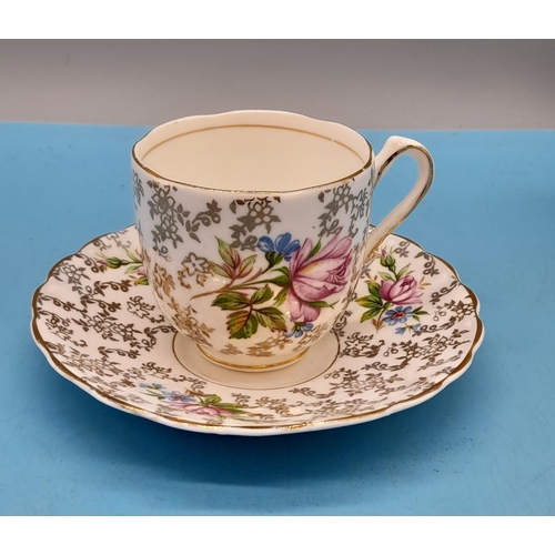 92 - English Bone China Part Coffee Set with a Chintz and Floral Decoration and Gilded Trim. Marked Ferne... 