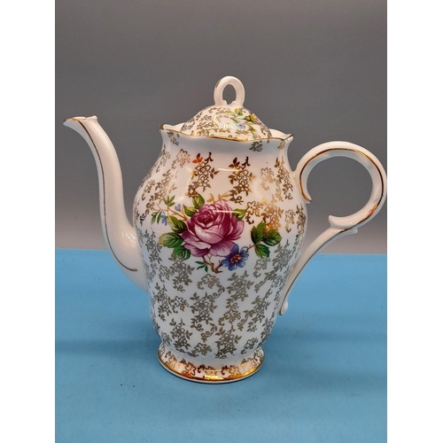 92 - English Bone China Part Coffee Set with a Chintz and Floral Decoration and Gilded Trim. Marked Ferne... 