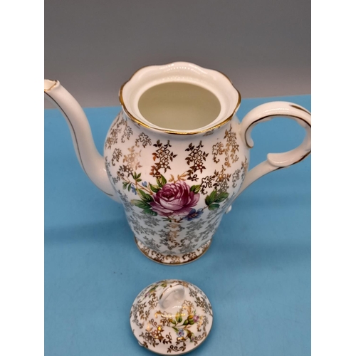 92 - English Bone China Part Coffee Set with a Chintz and Floral Decoration and Gilded Trim. Marked Ferne... 