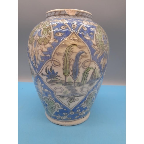 56 - 19th Century Persian Iznik Style Faience Pottery 25cm Vase decorated with a Landscape Scene with Flo... 