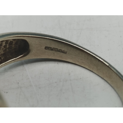 63 - 375 Hallmarked Gold Ring with Cabochon Size T, 7 Grams.