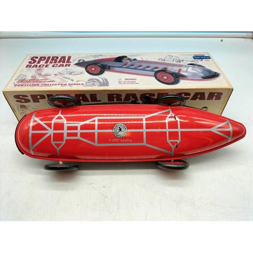 68 - Boxed Tin Plate Spiral Race Car W/O. 32cm Long.
