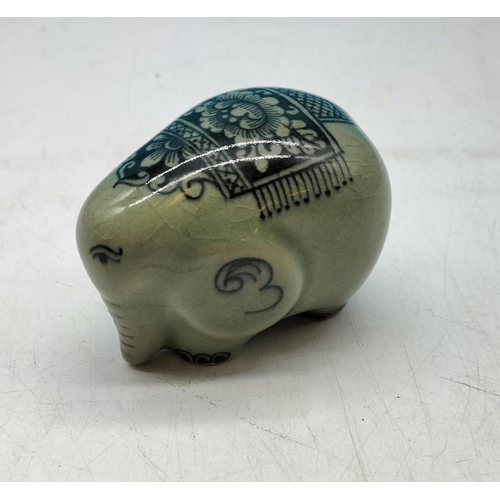 70 - Celadon Glazed Wedding/Celebration Decorated Elephant. 6cm high, 8cm long.