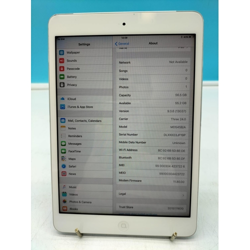 75 - iPad Mini 60GB, Model MD54B/A. Open to All Networks Version Update 15. W/O.