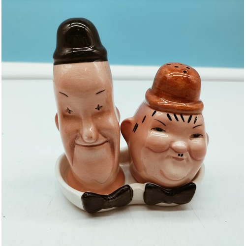 87 - Beswick 'Laurel and Hardy' Salt and Pepper Pots on Stand. 11cm Tall.