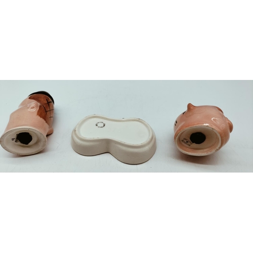 87 - Beswick 'Laurel and Hardy' Salt and Pepper Pots on Stand. 11cm Tall.