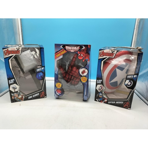 28 - Boxed 3D Lighting Innovations Marvel 'Spidey Hand', 'Thor Hammer' and 'Captain America Shield'.