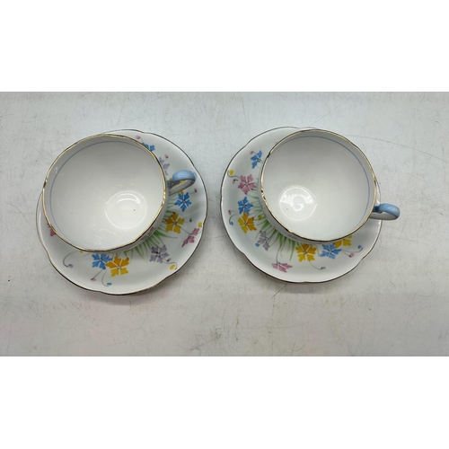 57 - (416) - Grafton China Hand Painted Cups and Saucers (2) in a Floral Pattern. 6304.