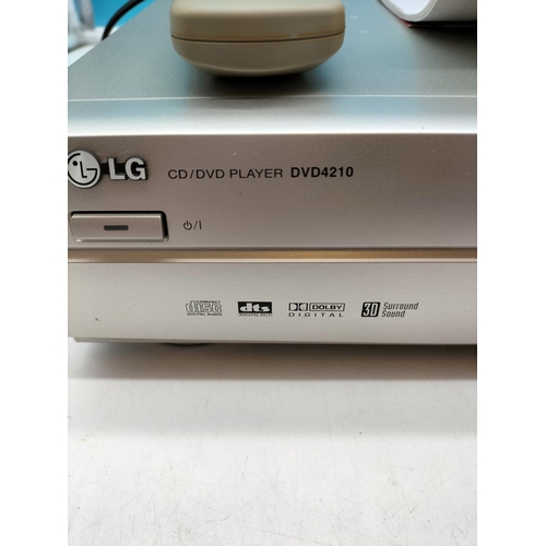 53 - (391) - LG CD/DVD Player, Model DVD-4210   W/O