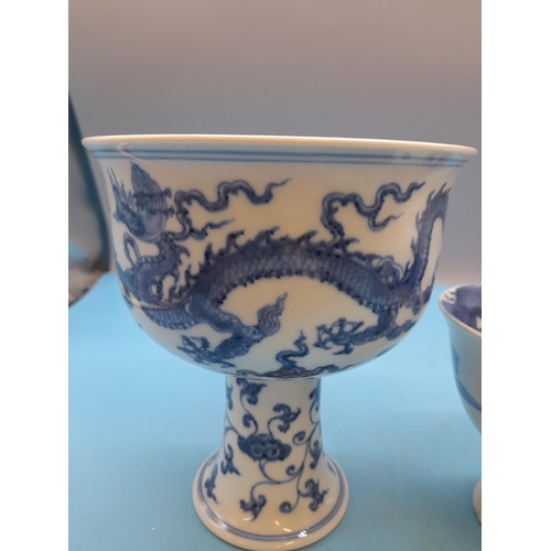 25 - (186) - Two Chinese Blue and White High Stem Cups, One with Five Claw Dragon Amongst Floral Decorati... 