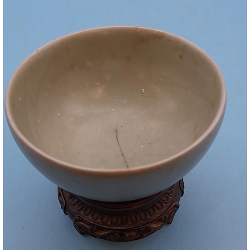 27 - (193) - 18th/19th Century Chinese Celadon Bowl on Wooden Pedestal. 7cm High.