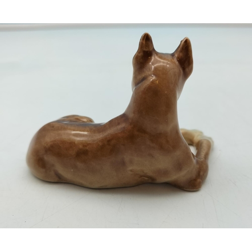 348 - Goebel Figure of a Boxer Dog. 5cm High x 9cm long.