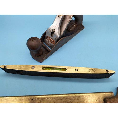 262 - Brass and Wood Spirit Level, Brass Wood Saw and Record Plane. Longest 49cm.