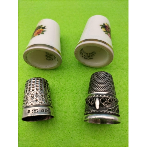 283 - Hallmarked Silver Thimble, 2 x Royal Albert 'Old Country Roses' Thimbles plus 1 Other.