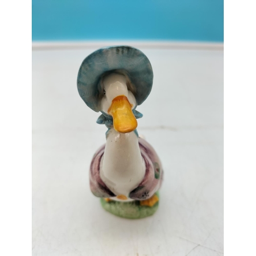 318 - Beswick Beatrix Potter's Figure 'Jemima Puddleduck' Early Gold Backstamp. 10.5cmTall.