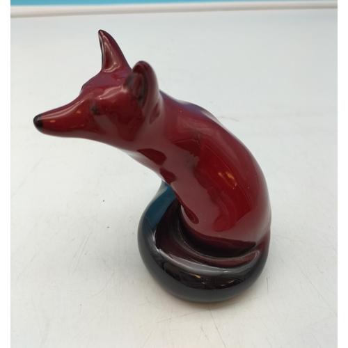 324 - Royal Doulton Flambe Black Tail Sitting Fox Figure. 11cm Tall