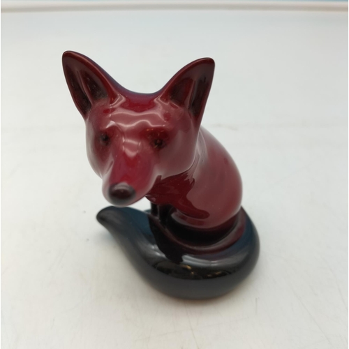 324 - Royal Doulton Flambe Black Tail Sitting Fox Figure. 11cm Tall